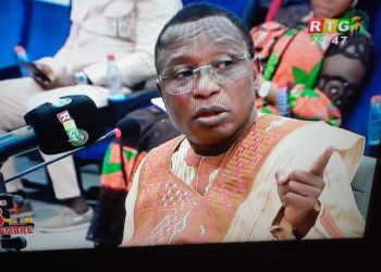 A screen grab of former Guinean military leader Moussa Dadis Camara testifying in his trial in Conakry. Photo credit, Kemo Cham, ManoReporters.