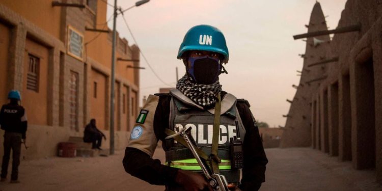 Minusma army patrol in front on the Great Mosque in Timbuktu, Mali on December 8, 2021. Photo | FLORENT VERGNES | AFP