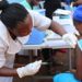 A school pupil being injected with the HPV vaccine at the FAWE Secondary School for girls in Soldier Town, in the East end of Freetown.