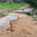 A major road cut off by flooding. Photo credit, James Flee, ManoReporters