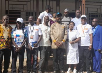 Mohamed Bailor Jalloh, CEO of FOCUS 1000 and his team pose with Bombali District District Medical Officer and his team after the meeting.