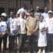 Mohamed Bailor Jalloh, CEO of FOCUS 1000 and his team pose with Bombali District District Medical Officer and his team after the meeting.