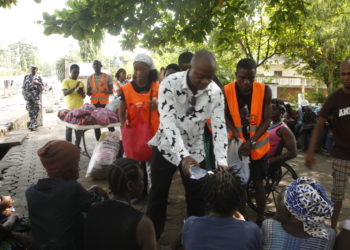 Ansumana Konneh from the Mental Health and Psycho-social Support Directorate in the Ministry of Social Welfare officially launched the 2024 feeding programme of SWSL. Photo credit, Hassam Koroma, ManoReporters.