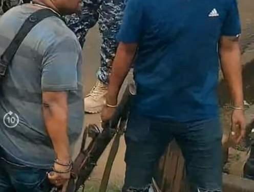 This surveillance image released by the government in December purportedly showed Amadu Koita at a scene in Freetown on November 26. Koita is among 11 people found guilty on Monday, July 22, 2024 and sentenced after a trial for treason.