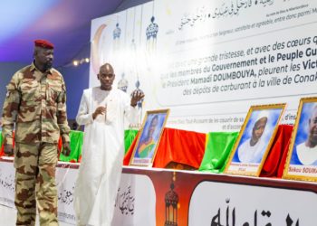 Guinea's junta leader General Army Commanda Mamadi Doumbouya on Friday, 2 February, 2024, pays his respect to victims of the December 18 oil depot explosion in Conakry. Photo credit, Presidency of Guinea.