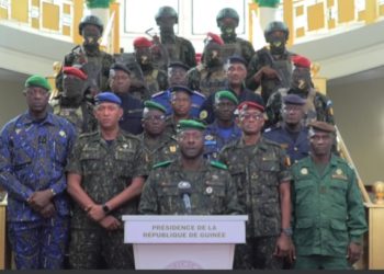Junta spokesman General Amara Camara, surrounded by military collegaues, reads a presidential decree on Monday, january 19 in Conakry. Screenshot of video image. Kemo Cham, ManoReporters