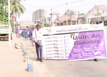 School pupils march along a highway in Freetown as part of commemoration of World Neglected Tropical Diseases in Sierra Leone on January 30th, 2024. Photo credit, Ibrahim Barrie, ManoReporters