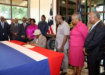 President Boakai signs Executive Order 131, paving war for the creation of war and economic crimes court. Photo credit, Executive Mansion.