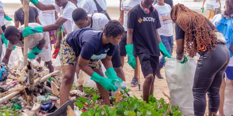 Volunteers sort out plastic from trash alone Lumley Beach on Saturday, 26th October, 2024. Image, EU Delegation to Sierra Leone