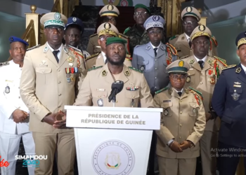 Guinean junta spokesman, Major General Amara Camara, flanked by fellow decorated officers, rejected as “rumors” suggestions that the country is harboring foreign troops. Image, screengrab of video from Presidency of Guinea.