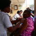 Foday Ambrose Marah, District Operations Officer for the Western Area Urban District Health Management Team, receives his dose of the vaccine at the Princess Christian Maternity Hospital on December, 2024. Image, Dennis Alfred Cole, ManoReporters.