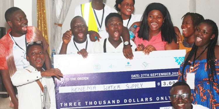 Members of Team Kenema Water Supply pose with the symbolic cheque of USD3,000 after being declared winner of the maiden edition of the Sierra Leone Afinnovate Challenge in Bo City on Saturday, September 2025. Image, Emmanuel Kamara, ManoReporters.