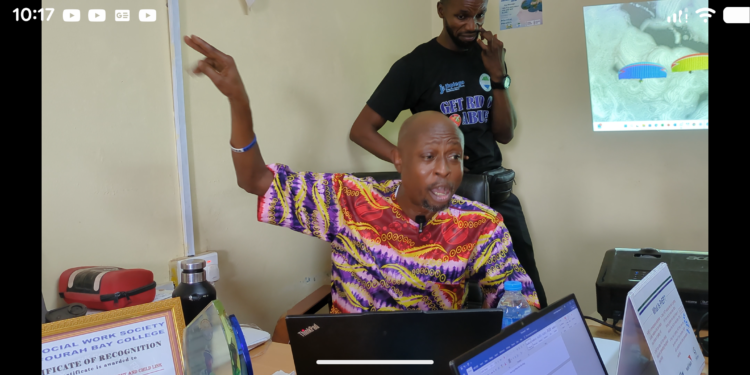 Habib T Kamara, Executive Director of SLYDCL, addresses young drug users at an event organized by SLYDCL on October 11, 2025.