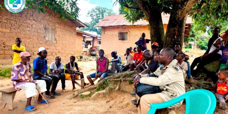 Health workers engage a community as part of Operation Find Them All in Sierra Leone's Mpox response efforts. Image, NPHA.