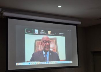 The Minister of Health, Dr. Austin Demby, addressing delegates in a press conference through an online link from Washington D.C. Image, MOH Communications.