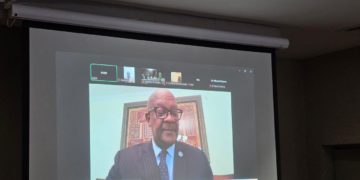 The Minister of Health, Dr. Austin Demby, addressing delegates in a press conference through an online link from Washington D.C. Image, MOH Communications.