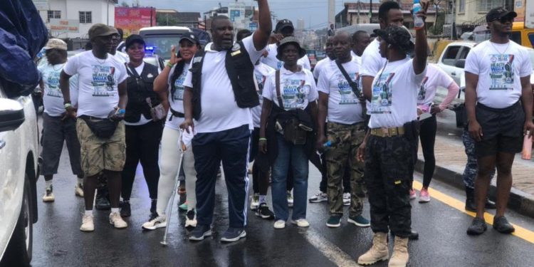 Andrew Jaiah Kaikai, Executive Director of NDLEA, takes part in a health walk on June 20th, as part of commemoration of World Drugs Day. The walk was held ahead of the day itself on June 26. Image, NDLEA.