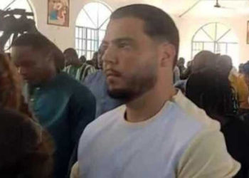 This image shows what is believed to be Bolle Jos Leijdekkers in a church besides the daughter of Sierra Leone’s President Julius Maada Bio somewhere in the southern part of the country. Image, unknown source.