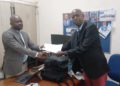 SLYDCL’s Executive Director Habib T. Kamara presenting the Policy Brief to Prince Bull-Luceni, the newly appointed Executive Director of NDLEA Sierra Leone on Thursday, September 17th, 2026. Image, SLYDCL.