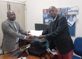SLYDCL’s Executive Director Habib T. Kamara presenting the Policy Brief to Prince Bull-Luceni, the newly appointed Executive Director of NDLEA Sierra Leone on Thursday, September 17th, 2026. Image, SLYDCL.